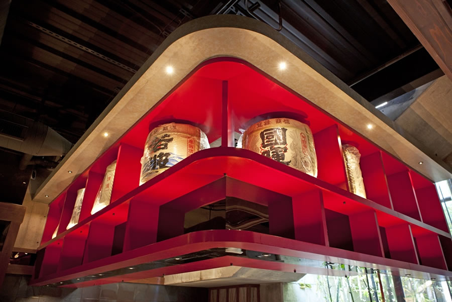 Izakaya Den red wood with sake barrels_900